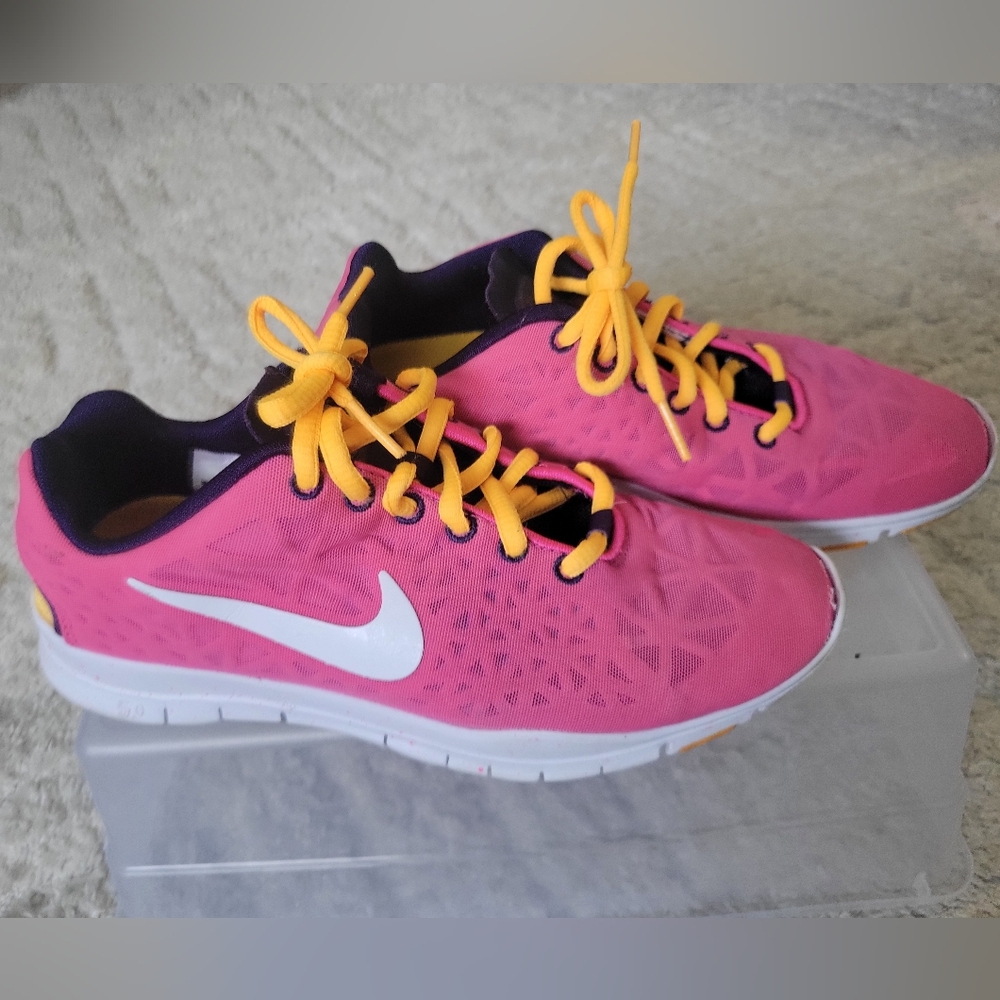 Nike Pink Sneakers with Yellow Laces